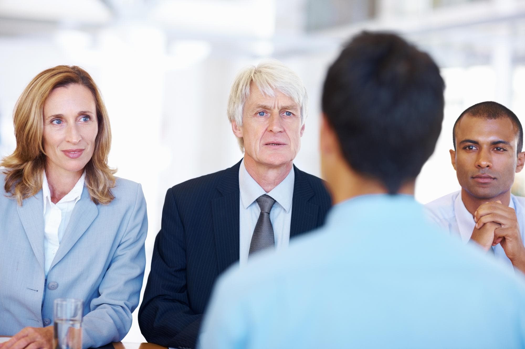 Team business people and job seeker in office for interview questions and hiring process for corporate Interviewer human resources staff or candidate in boardroom for recruitment answer or intro